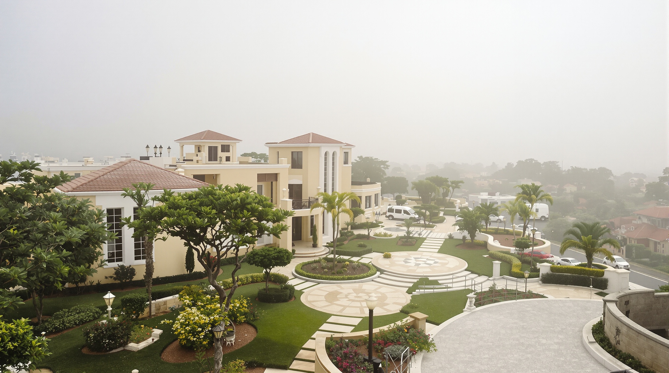Entrada residencial do Fasano Fazenda Boa Vista com jardins manicurados e luz natural